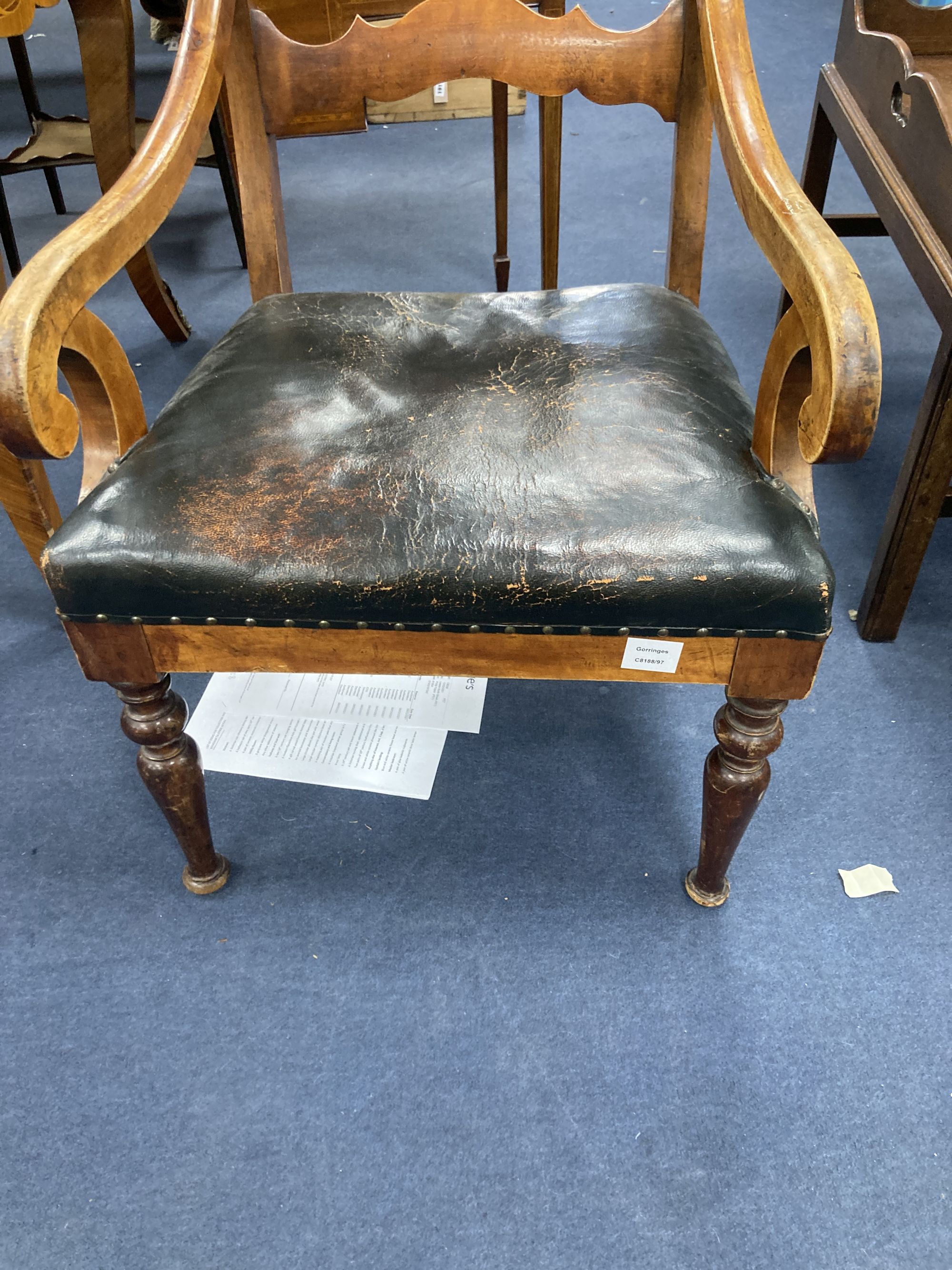 A 19th century Swedish fruitwood elbow chair